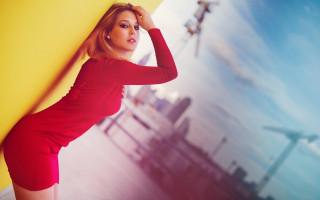 Woman red dress yellow wall - leaning free wallpaper for desktop