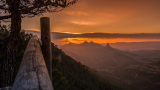 Wooden fence mountains sunset nature - a sunset in the background and mountains free wallpaper