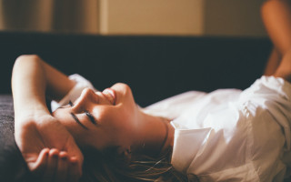 Woman laying blurry photorealistic indoor - free vintage wallpaper