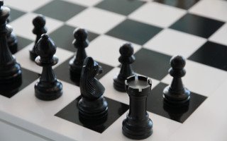 Chessboard blackwhite silverpawn abstract stockphoto - a chess board free wallpaper for desktop