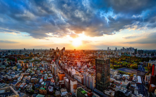 Cityscape sunset clouds tokyo bridge - a city in the foreground free wallpaper