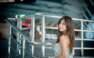 Woman smiling dress railing classroom - a metal free wallpaper