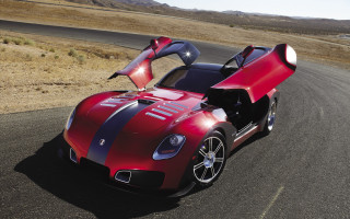 Red sports car desert road 3 - a road in the desert free wallpaper