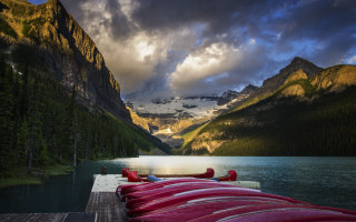 Red canoes mountain lake sunset - a mountain lake free wallpaper