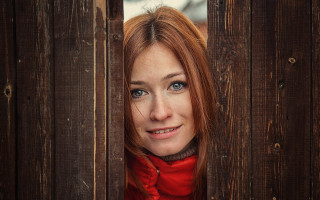 Woman redhair fence redscarf jacket - a wooden fence free wallpaper