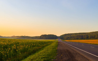Sunflower road hill mountain beach - a hill in the distance free wallpaper