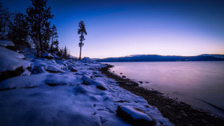 Snowy shore lake mountains dusk - a lake and mountains free wallpaper