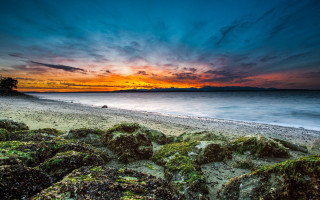 Beach rocky shore sunset clouds - a few rock free wallpaper