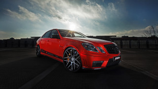 Red car sunlight clouds rimlighting - a red car free wallpaper