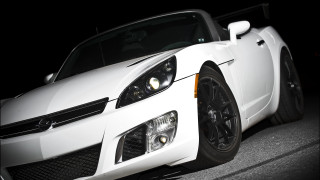 White sports car hood up 3 - a parking lot free wallpaper