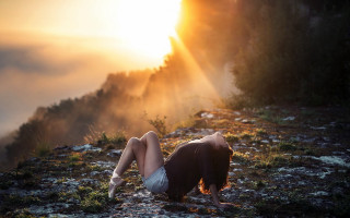 Woman rocky hillside sunset cinematic - a rocky hillside free wallpaper for desktop