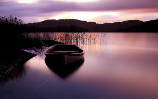Boat water sunset mountain purple - tranquil free wallpaper