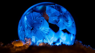 Blue crystal ball silhouette macro - the ground below free wallpaper