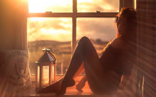 Woman window sill sunset mountains - natural free wallpaper for desktop