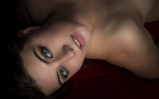 Blue eyes serious woman red - a red blanket free wallpaper for desktop