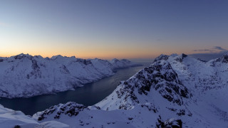 Mountain lake snowy horizon cloudy - a few snow covered mountains free wallpaper