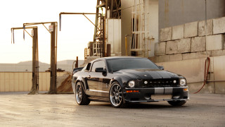 Black mustang gas pump building - a black mustang mustang free wallpaper