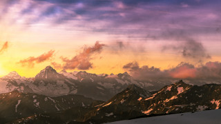 Sunset mountain range clouds snowboard - a sunset view of a mountain range free wallpaper