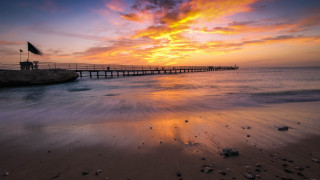 Pier ocean sunset colorful sky - a colorful sky above free wallpaper