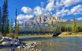 Bridge river mountains trees sky - a bridge over a river free wallpaper