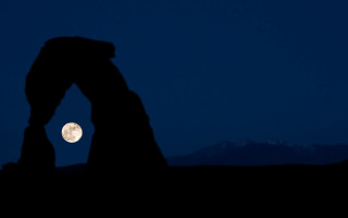 Large rock formation moon mountain - a large rock formation free wallpaper