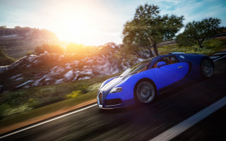 Blue sports car mountains forest - duccio free wallpaper for desktop