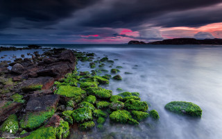 Rocky shore moss sunset mystical - sky in the background free wallpaper for desktop
