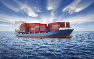 Cargo ship ocean clouds blue - under free wallpaper