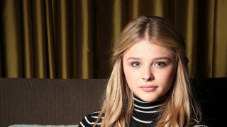 Woman couch suitcase curtain relaxing - a curtain behind her free wallpaper