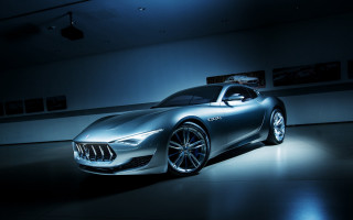 Silver sports car dark room 14 - a white wall free wallpaper for desktop