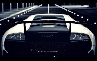 White black sports car night - the side of it free wallpaper