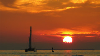 Sailboat ocean sunset clouds horizon 4 - sunrise time free wallpaper