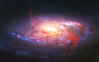 Spiral galaxy bright red center - a spiral galaxy free wallpaper