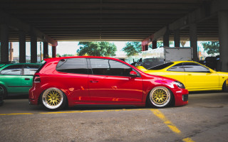 Red car parking lot yellow - bright color free wallpaper