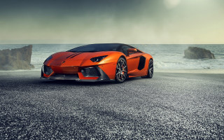 Orange sports car ocean rock - nice looking orange sports car free wallpaper