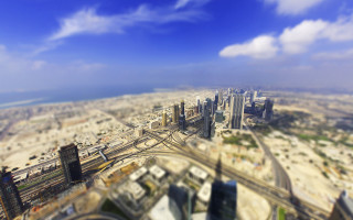 Cityscape beach bridge skyline tiltshift - a view of a city free wallpaper