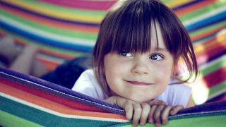 Little girl hammock smile rainbow - a hammock free wallpaper