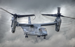 Military helicopter cloudy sky propellers 2 - a military helicopter free wallpaper