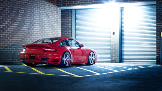 Red car parking lot building 8 - a red car free wallpaper