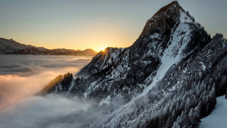 Snowy mountain sunset trees clouds - a sun free wallpaper