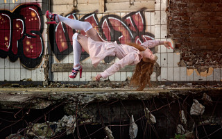 Woman skateboard trick graffiti surrealist - a graffiti wall free wallpaper