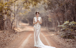 Woman white dress woods autumn - a dirt road free wallpaper