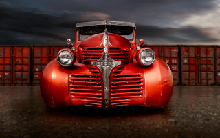 Red car cargo container night - a red car free wallpaper