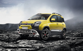 Yellow car rocky mountains clouds - a yellow car free wallpaper