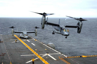 Navy aircraft flying ship ocean - over a ship in the ocean free wallpaper
