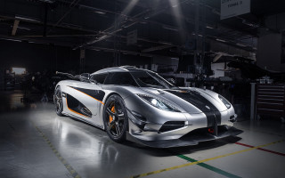 Silver cobra sports car garage - side and a man free wallpaper for desktop