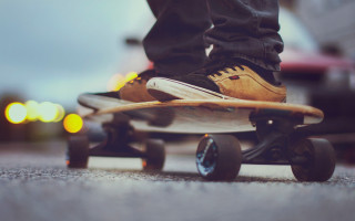 Skateboarder city night lights tiltshift - daren bader free wallpaper
