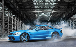 Blue sports car smoking garage - photorealism free wallpaper for desktop