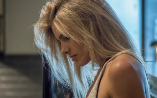 Blonde woman cellphone hallway stairs - barbara greg free wallpaper