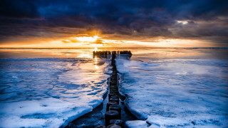 Frozen lake pier cloudy sky - a long wooden pier free wallpaper
